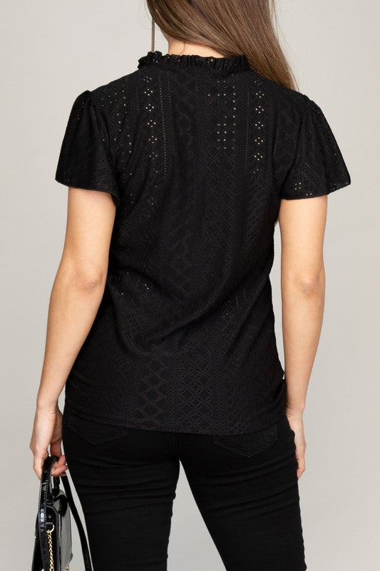 Embroidered eyelet blouse with ruffle